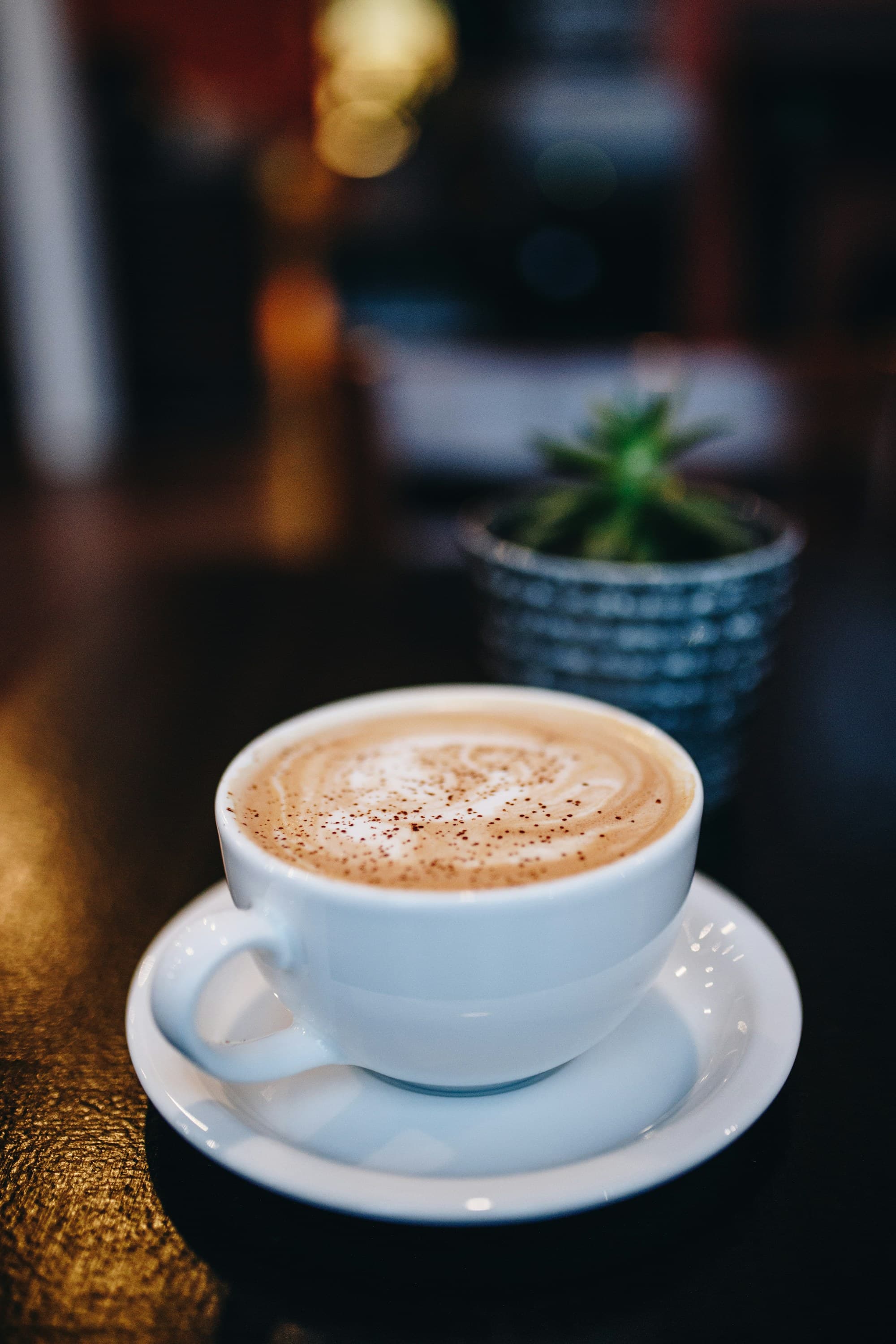 Masala chai latte dusted with cinnamon